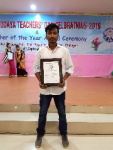 Sir Shubham Baruah, M.Sc (Science) receiving the teachers' day award organized by AAPSA.jpg